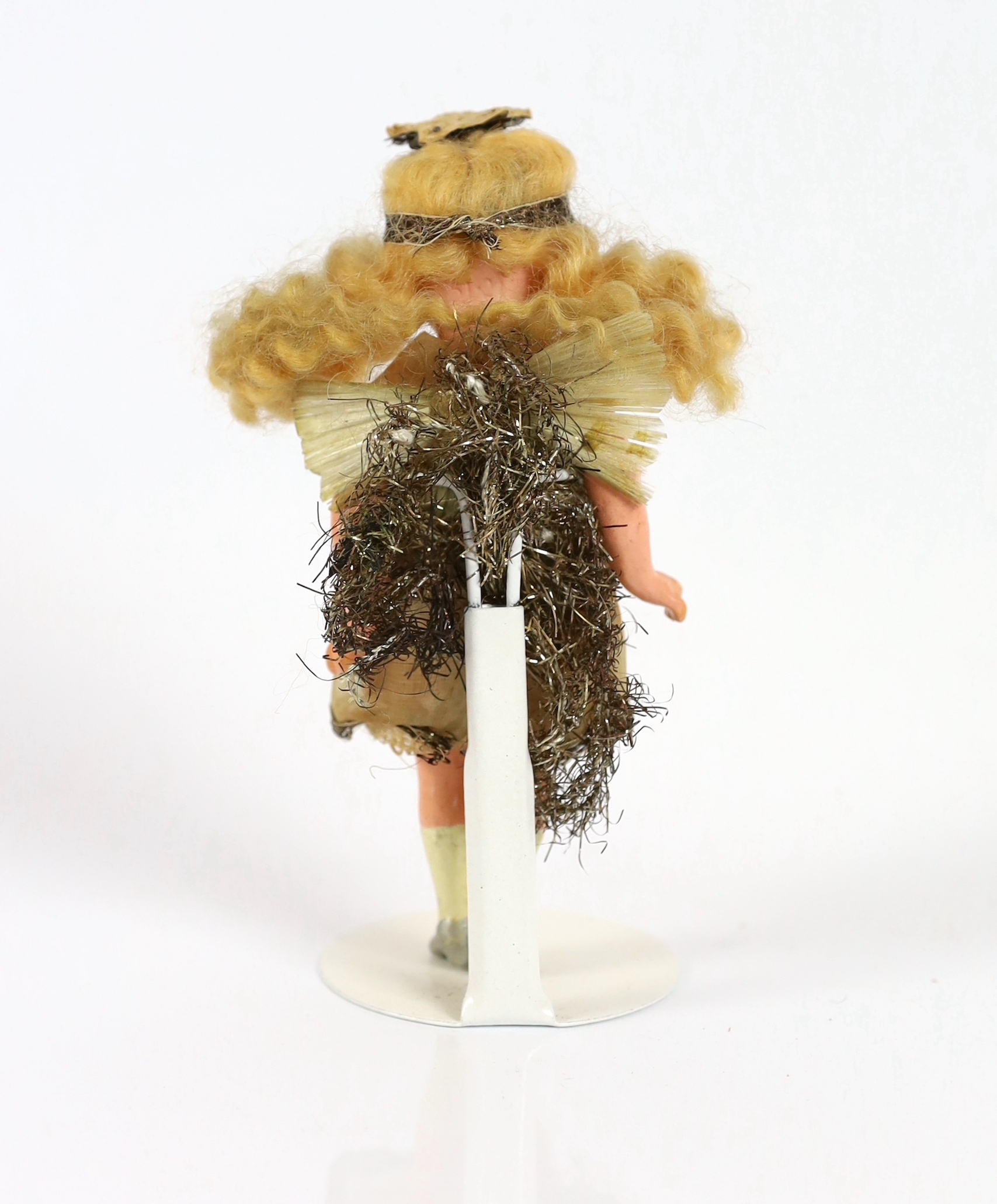 A composition fairy doll, c.1920m 15cm, with a china headed doll on soft body with bisque boots, c.1870, 15cm